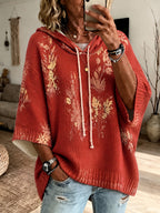 Eden | Damescape met capuchon en bloemenprint – pullover met 3/4-mouwen en trekkoord