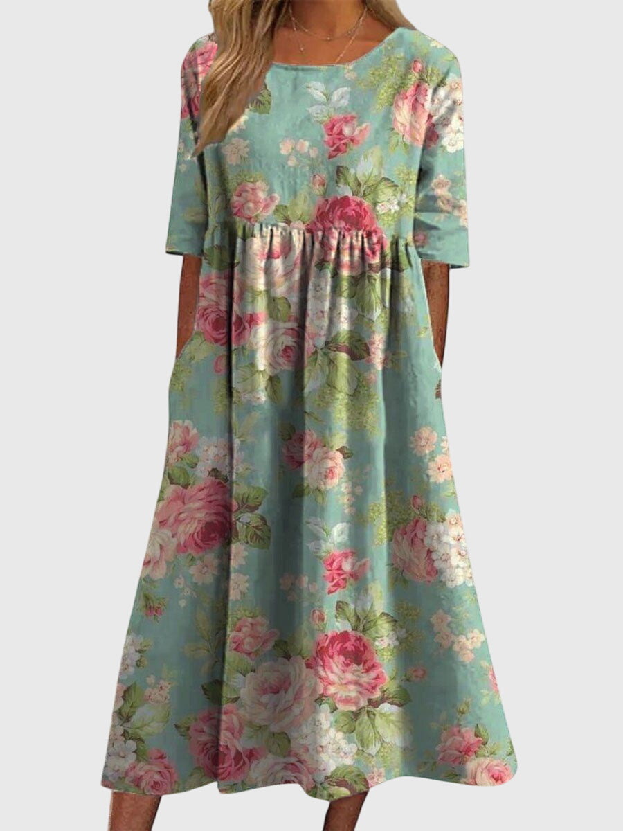 Iona | Maxijurk met bloemenprint en V-hals voor dames – Elegante A-lijn jurk met korte mouwen