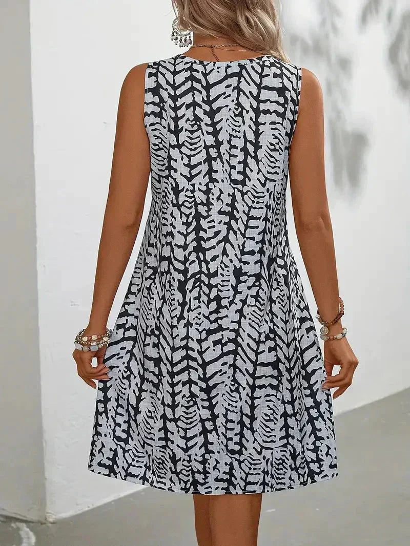 aiza | Dames Mouwloze Zomerjurk – Midi-jurk met Abstracte Print