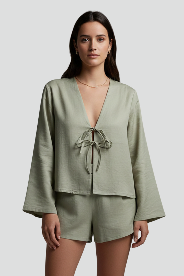 Rayae | Dames diepe V-hals blouse met veterdetail – lange mouwen