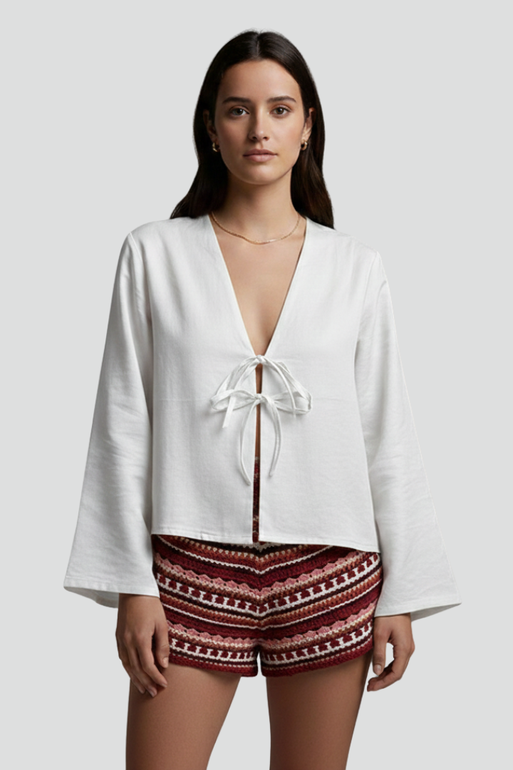 Rayae | Dames diepe V-hals blouse met veterdetail – lange mouwen