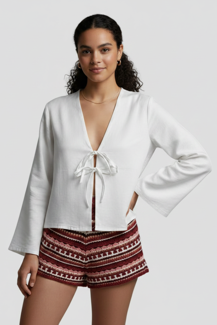 Rayae | Dames diepe V-hals blouse met veterdetail – lange mouwen