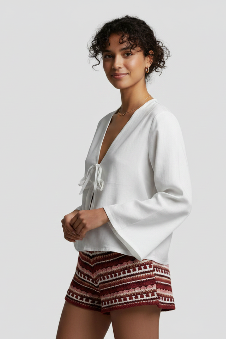 Rayae | Dames diepe V-hals blouse met veterdetail – lange mouwen