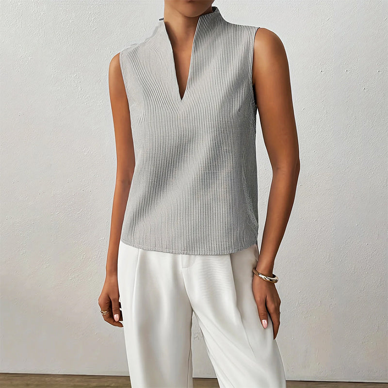 Rhea | Mouwloze damesblouse met knopen – Gestreepte casual top met V-hals