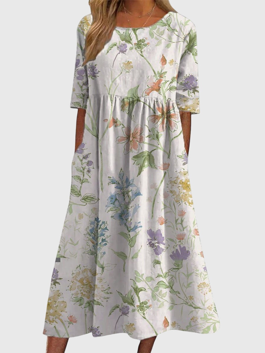 Iona | Maxijurk met bloemenprint en V-hals voor dames – Elegante A-lijn jurk met korte mouwen