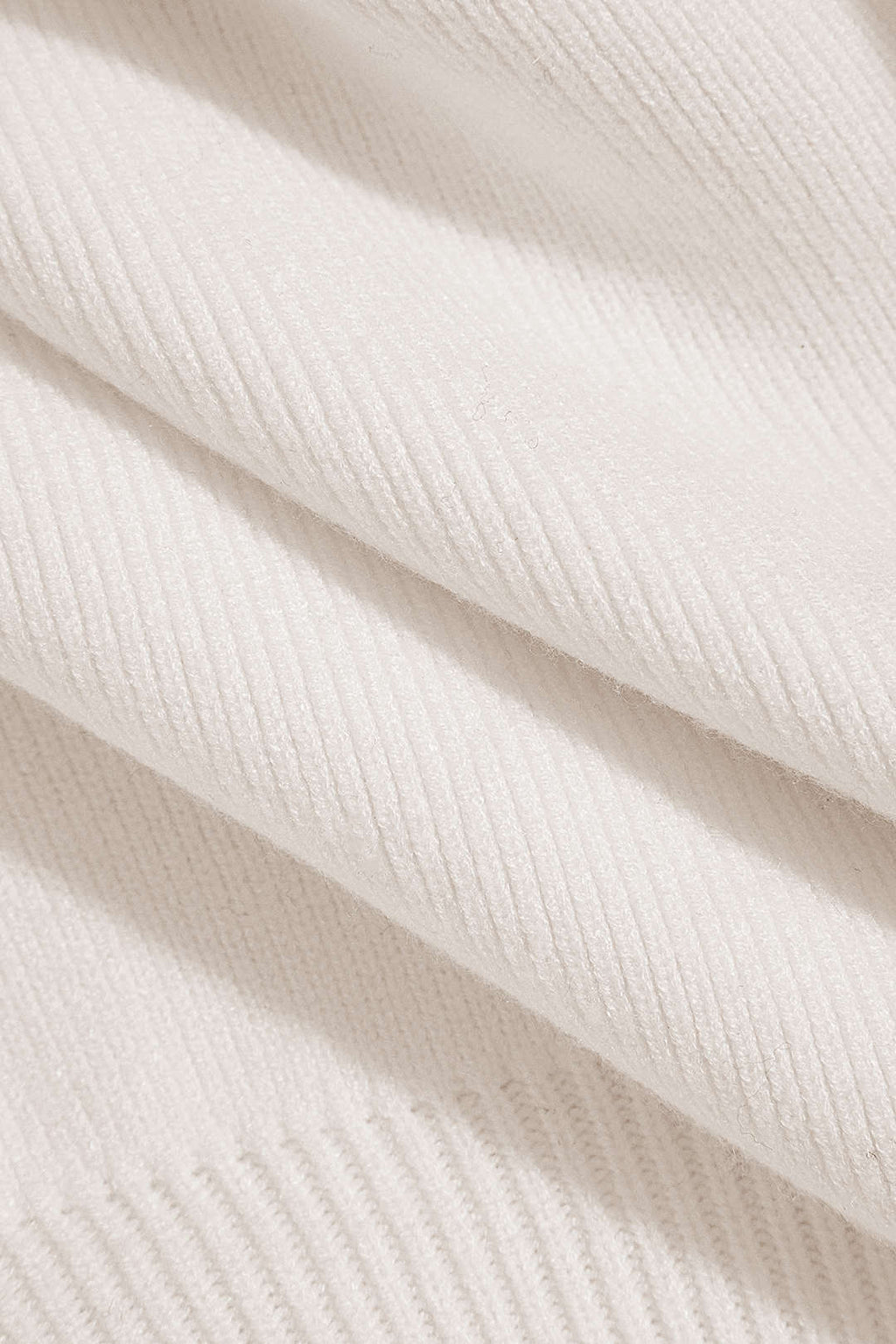 Clorinda | Elegant trui-vest met gouden knoop